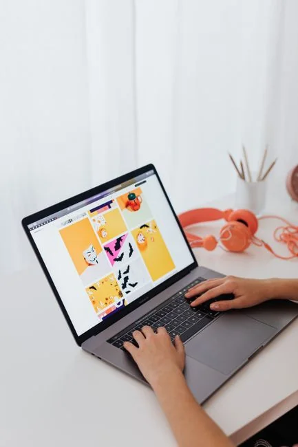A modern work environment featuring a laptop, tablet, and smartphones, perfect for technology professionals and freelancers.